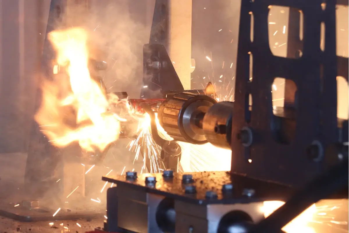 Lithium-ion battery cell undergoing nail penetration testing and entering thermal runaway.